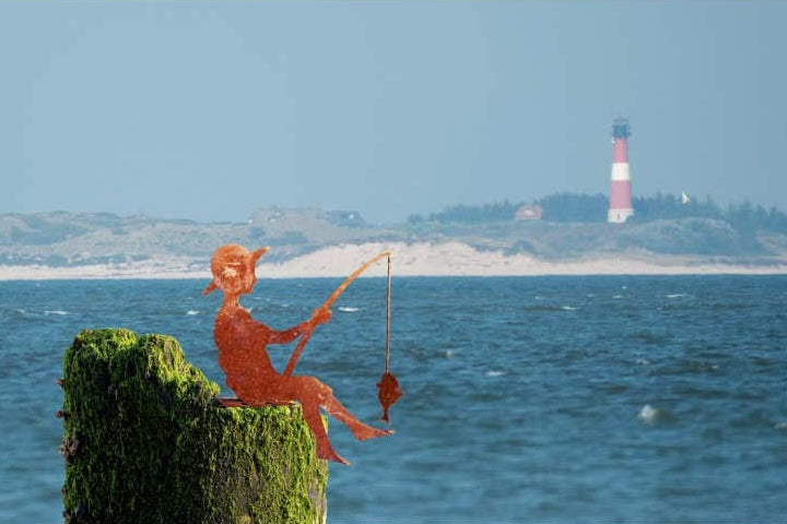 Sitzender Angler aus Edelrost